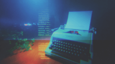 A typewriter on a desk lit by deep blue evening light.